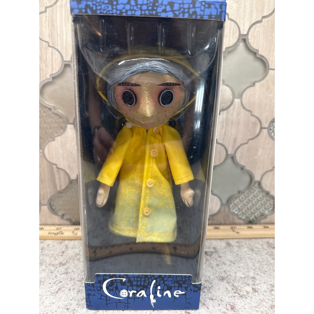 NECA Coraline Doll Prop Replica Button Eyes Yellow Raincoat LAIKA New in Box